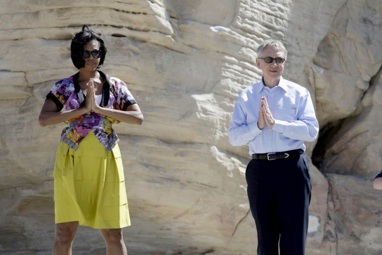 Image: First Lady Obama and Senate Majority Leader Reid take part in an exercise activity at the Red Rock Conservation National Conservation Area near Las Vegas